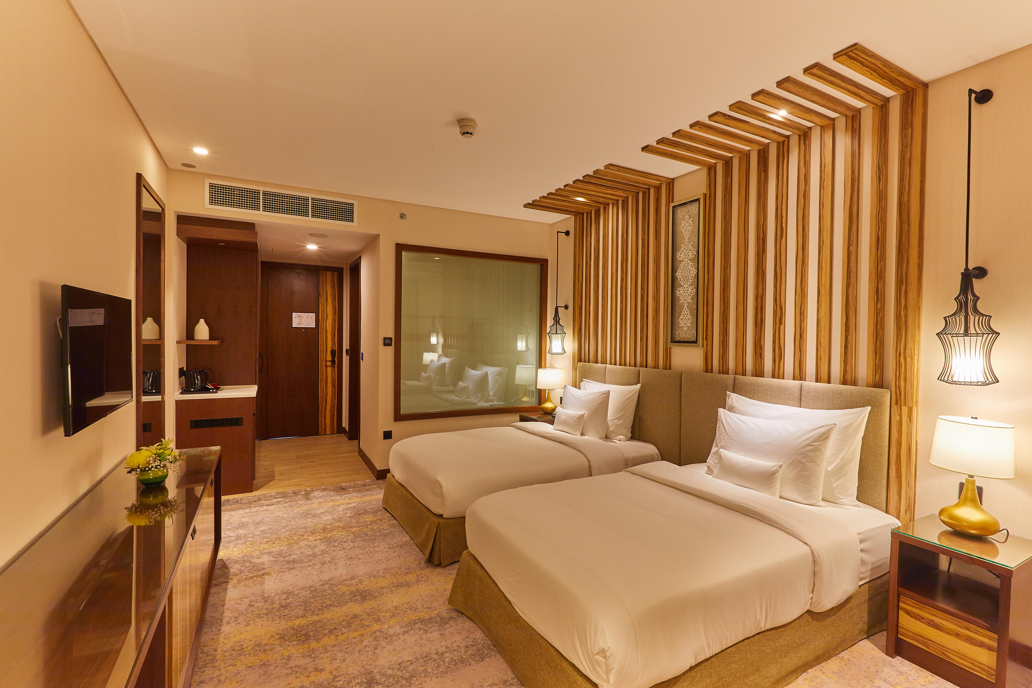 Millennium Resort Салала Экстерьер фото Deluxe Room