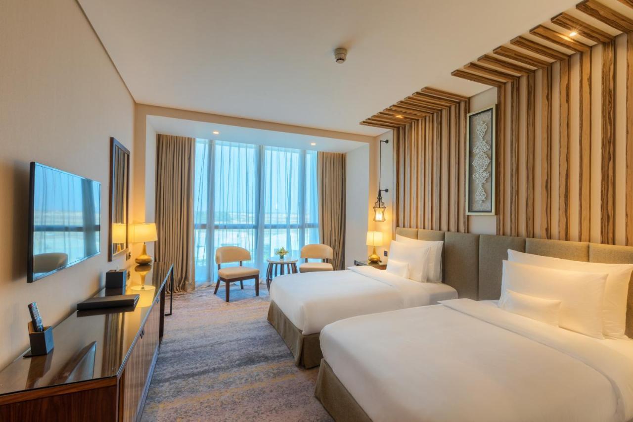 Millennium Resort Салала Экстерьер фото Deluxe Room