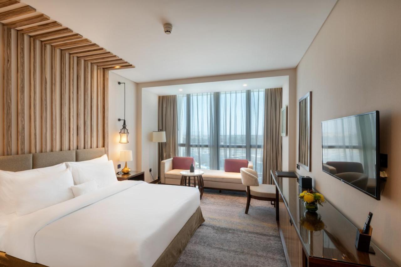 Millennium Resort Салала Экстерьер фото Deluxe Room