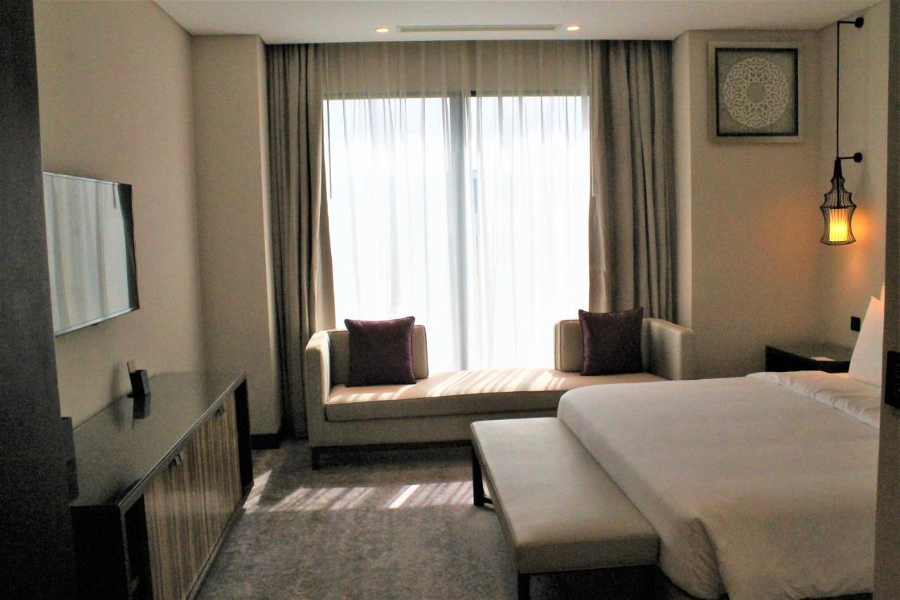 Millennium Resort Салала Экстерьер фото A room at the hotel