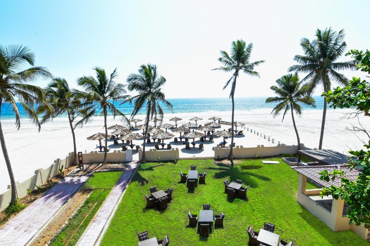 Millennium Resort Салала Экстерьер фото View of the beach from the hotel